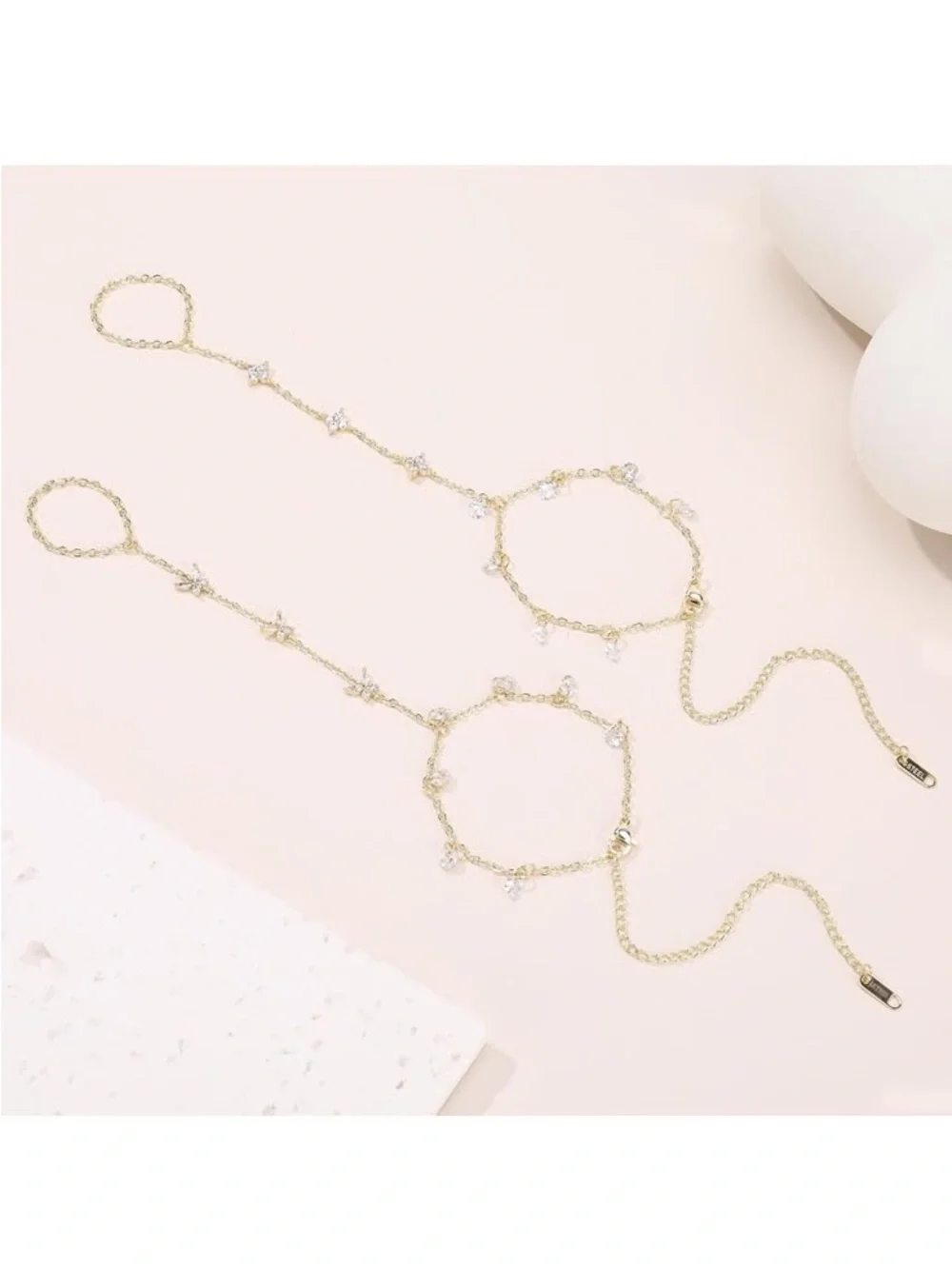 Anthropologie Gold Tone Floral Hand Chain with Clear Drops